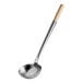 An Emperor's Select large metal wok ladle with a wooden handle.