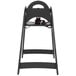 A Koala Kare black high chair with a seat and a strap.