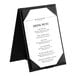 A black Acopa Prime 2-view A-frame table tent holding a menu.