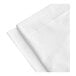 A folded white 1888 Mills Flourish queen size fitted sheet on a white background.