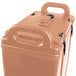 A beige Cambro insulated soup carrier with black handles.