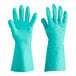 A pair of green Cordova nitrile gloves with a flocked lining.
