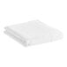 A folded white 1888 Mills Oasis Queen Size flat sheet.