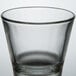 A close up of a clear Libbey shot glass.