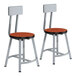 Two National Public Seating metal lab stools with wood seats and backrests.