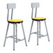Two National Public Seating metal lab stools with marigold seats and backrests.