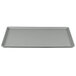 A white rectangular Cambro dietary tray with a gray surface and black border.