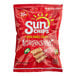 A red and white bag of Sun Chips Garden Salsa Whole Grain Chips.