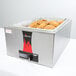 A Vollrath stainless steel countertop warmer with food inside.