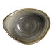 A close-up of a RAK Porcelain deep bowl with a spiral pattern.