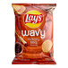 A white bag of Lay's Wavy Hickory Barbecue potato chips.