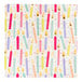 A white paper napkin with colorful birthday candles and gold foil confetti.