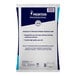A white and blue bag of Morton Pure and Natural Water Softening Crystals with blue text.