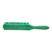 A Carlisle Sparta green counter brush with green bristles.