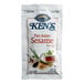 A Ken's Foods Pan Asian Sesame Dressing packet with a white background.