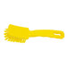 A yellow Carlisle Sparta polyester detail brush with a handle.