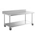 A stainless steel Regency work table with undershelf and casters.