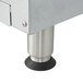 The metal legs of an APW Wyott Workline countertop range with rubber grips.