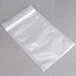 A package of ARY VacMaster clear plastic chamber vacuum bags with a zipper on a gray surface.