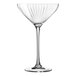 A clear Chef & Sommelier coupe glass with a curved stem.