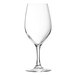 A close-up of a clear Chef & Sommelier wine glass.
