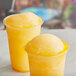 Two cups of Philadelphia Water Ice Orange Italian Ice