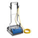 A NaceCare Solutions Duplex DP 420 walk behind floor scrubber with a yellow cord.