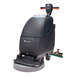 A NaceCare Solutions walk behind floor scrubber with a black base and green pad on wheels.