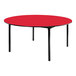 A red table with a round top and black T-mold edge and legs.