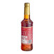 A 750 mL plastic bottle of Torani Almond Roca flavoring syrup with a red label.