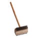 A Choice grill and charbroiler brush with a wooden handle and steel bristles.