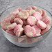 A bowl of Vidal pink and white gummy candy.
