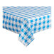 A blue and white checkered Table Mate plastic table cover on a table.