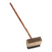 A wooden brush with metal bristles on one end and wooden brush bristles on the other.