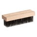A Choice wooden grill brush head with black bristles.
