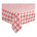 A red and white checkered Table Mate plastic table cover on a table.