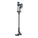 A NaceCare Solutions black and silver cordless stick vacuum cleaner with a long silver pole and round top.