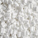A pile of white Lavex foam packing peanuts.