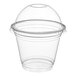 A clear PET plastic cup with a dome lid.