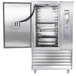 A Traulsen stainless steel refrigerator with a door open.