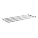 A Regency stainless steel dunnage shelf with wire mat. A white metal shelf with metal wire mat.