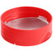 A red plastic container with a red dual-flapper induction-lined spice lid.