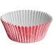 A pink and white Enjay baking cup in a cupcake pan.