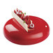A red mirror-glazed dessert with strawberries on top in a Pavoni Planet silicone baking mold.