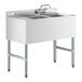A Regency stainless steel underbar sink with left drainboard and faucet.