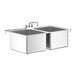A Regency stainless steel double bowl drop-in sink with a faucet over two sinks.