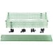 A Metro Super Erecta wire shelf with green Metroseal plastic tubes on a table.