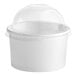 A white paper food container with a clear dome lid.
