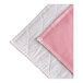 A close up of a pink and white quilted cloth with a white border.