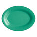 A green platter with a wide rim on a white background.